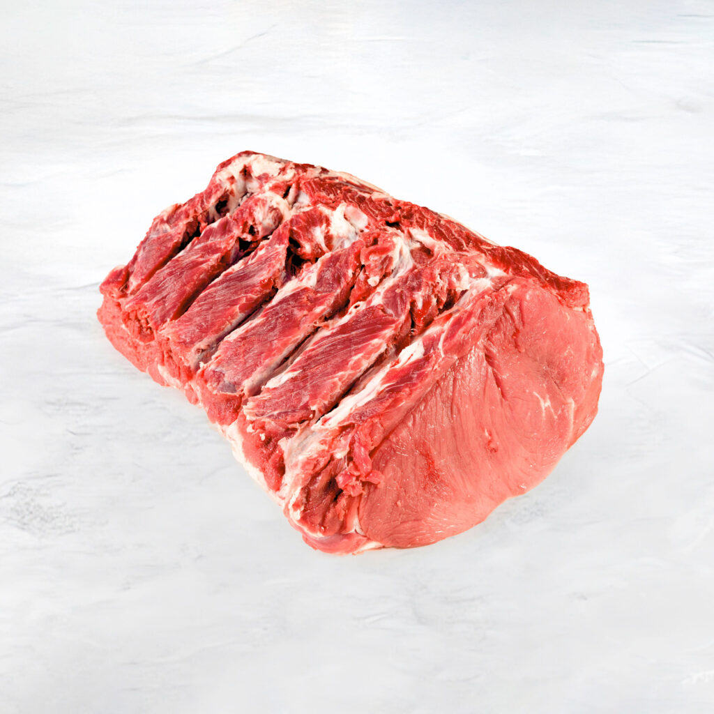 entrecote di fassone piemontese dal colore rosso vivo su fondo marmo